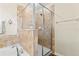 Bathroom featuring a soaking tub and separate tiled shower enclosure at 11871 Crestridge Loop, Trinity, FL 34655
