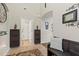 Welcoming foyer featuring tile flooring, a bench, and decor leading to other rooms in the home at 11871 Crestridge Loop, Trinity, FL 34655