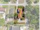 Aerial view of property with well-defined boundaries, landscaping, and outdoor amenities at 1209 W Adalee St, Tampa, FL 33603