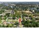 Beautiful aerial view of the residential area showcasing the property, lush greenery and a body of water at 1209 W Adalee St, Tampa, FL 33603