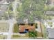Aerial view of a home showcasing its landscaping, mature trees, and neat lawn at 1209 W Adalee St, Tampa, FL 33603