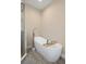 This sleek soaking tub is accessorized with a caddy for maximum relaxation at 1209 W Adalee St, Tampa, FL 33603