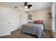 Bright bedroom featuring a closet with a double door and wood-look flooring at 1209 W Adalee St, Tampa, FL 33603