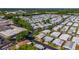 An aerial view of a mobile home community with tree-lined streets at 12501 Ulmerton Rd # 89, Largo, FL 33774