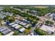 An aerial view shows a mobile home park next to a highway and shopping centers at 12501 Ulmerton Rd # 89, Largo, FL 33774