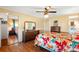 Bright bedroom with wood flooring, dresser, and ample closet space at 12501 Ulmerton Rd # 89, Largo, FL 33774