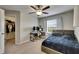 Bedroom with closet, workstation, window, and neutral-toned carpet and paint at 12952 Utopia Gardens Way, Riverview, FL 33579