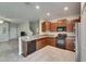 Spacious open kitchen with granite counters, and stainless appliances at 12952 Utopia Gardens Way, Riverview, FL 33579