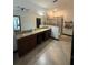 Bathroom featuring a double vanity with a tile floor and a shower enclosure at 13172 Green Violet Dr, Riverview, FL 33579