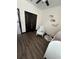 Well-appointed Bedroom with wood floors, comfortable seating and closet space at 13172 Green Violet Dr, Riverview, FL 33579