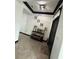Spacious foyer with HOME decor on the wall and decor on the shelf at 13172 Green Violet Dr, Riverview, FL 33579