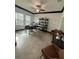 Bright home office with large windows and tile flooring at 13172 Green Violet Dr, Riverview, FL 33579