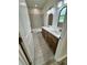 Double sinks, quartz countertops, and decorative backsplash in the bathroom at 13532 14Th St, Dade City, FL 33525