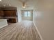 Dining area with ceiling fan and hardwood floors, next to the kitchen at 13532 14Th St, Dade City, FL 33525