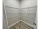 Walk-in pantry with installed shelving for storage at 13532 14Th St, Dade City, FL 33525
