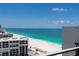 The spacious balcony overlooks the ocean and features a metal railing at 1390 Gulf Blvd # Ph-5, Clearwater, FL 33767