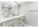 This bathroom features a double vanity, great storage, white countertops, and brushed nickel hardware at 1390 Gulf Blvd # Ph-5, Clearwater, FL 33767