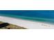 This is a full, unobstructed view of the beautiful white sandy beach at 1390 Gulf Blvd # Ph-5, Clearwater, FL 33767