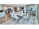 Beautiful open-concept living area showcasing modern kitchen, dining, and living spaces at 1390 Gulf Blvd # Ph-5, Clearwater, FL 33767