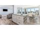 Bright living space with a marble island, and access to the balcony with city views at 1390 Gulf Blvd # Ph-5, Clearwater, FL 33767