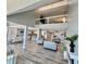 View of open floor plan with staircase, kitchen and dining room visible at 1390 Gulf Blvd # Ph-5, Clearwater, FL 33767