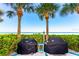 Community outdoor grill area by the beach at 1390 Gulf Blvd # Ph-5, Clearwater, FL 33767