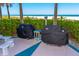 Community outdoor grill area with new grills, sink, and plenty of space to cook out and relax at 1390 Gulf Blvd # Ph-5, Clearwater, FL 33767