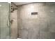 This shower has attractive tile work and features a built-in alcove for storage and multiple shower heads at 1390 Gulf Blvd # Ph-5, Clearwater, FL 33767