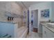 Charming bathroom with tiled shower and glass door at 1450 Palmetto St, Clearwater, FL 33755