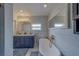 Relaxing bathroom with double vanity, a standalone tub, and updated finishes that create a spa-like retreat at 1450 Palmetto St, Clearwater, FL 33755