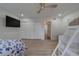 Bedroom featuring a twin-over-full bunk bed and a twin bed with an entrance to other rooms at 1450 Palmetto St, Clearwater, FL 33755