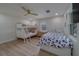 Bedroom featuring a twin-over-full bunk bed and a twin bed at 1450 Palmetto St, Clearwater, FL 33755