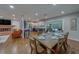 Open floorplan with dining area flowing into the living room and the updated kitchen at 1450 Palmetto St, Clearwater, FL 33755