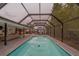 Breathtaking backyard pool and patio featuring comfortable seating and dining areas at 1450 Palmetto St, Clearwater, FL 33755