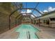 Picture-perfect pool offers the perfect place to cool off and relax at 1450 Palmetto St, Clearwater, FL 33755