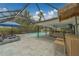 Stunning outdoor pool and patio with lounge chairs, dining, bar, and seating areas at 1450 Palmetto St, Clearwater, FL 33755