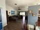 Open living room featuring modern decor, hardwood floors, and ample natural light at 16035 Grass Lake Dr, Tampa, FL 33618
