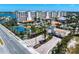 Aerial view of the beachfront condo and tennis courts, showcasing beautiful surroundings at 17735 Gulf Blvd # 304, Redington Shores, FL 33708