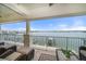 Spacious balcony offering stunning waterfront views, comfortable seating, and room for entertaining at 17735 Gulf Blvd # 304, Redington Shores, FL 33708