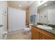 Cozy bathroom with neutral tiling, granite counters, and a shower-tub combo at 17735 Gulf Blvd # 304, Redington Shores, FL 33708