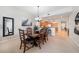 Dining room adjacent to kitchen offers seating for six in an open concept living space at 17735 Gulf Blvd # 304, Redington Shores, FL 33708