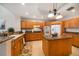 Spacious kitchen features granite countertops, tile flooring, and stainless steel appliances at 17735 Gulf Blvd # 304, Redington Shores, FL 33708