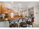 Kitchen featuring granite countertops, stainless steel appliances, and bar seating at 17735 Gulf Blvd # 304, Redington Shores, FL 33708