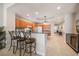 Kitchen featuring granite countertops, stainless steel appliances, and bar seating at 17735 Gulf Blvd # 304, Redington Shores, FL 33708