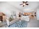 Cozy living room featuring comfortable sofas, stylish decor, and lots of natural light at 17735 Gulf Blvd # 304, Redington Shores, FL 33708
