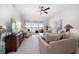 Inviting living room with neutral color scheme, comfortable seating, and balcony access at 17735 Gulf Blvd # 304, Redington Shores, FL 33708
