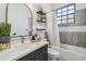 Charming bathroom with shower/tub combo and stylish vanity at 18902 Spring Hollow Dr, Lutz, FL 33559