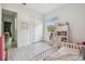 Bedroom featuring a closet, window, and shelving at 18902 Spring Hollow Dr, Lutz, FL 33559