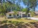 Well maintained landscaping and lawn on this charming single-Gathering home at 18902 Spring Hollow Dr, Lutz, FL 33559