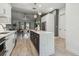 Open concept kitchen with stainless appliances and dining area at 18902 Spring Hollow Dr, Lutz, FL 33559